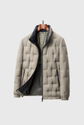 Quilted Down Puffer Jacket in Beige — front view