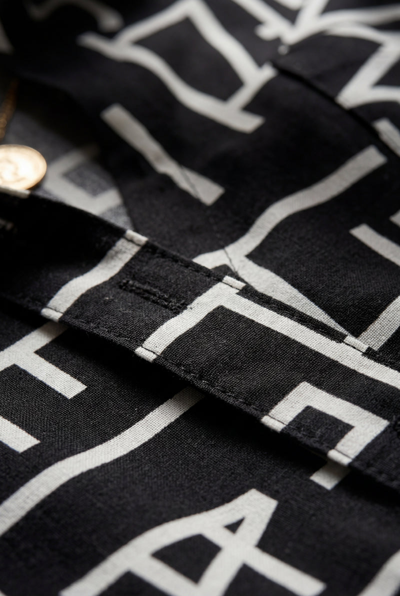 Black Abstract Print Button-up Blouse with Roll-tab Sleeves - Blouses - Photo 4