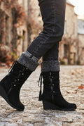 Faux Shearling Knee-High Boots in Black — side