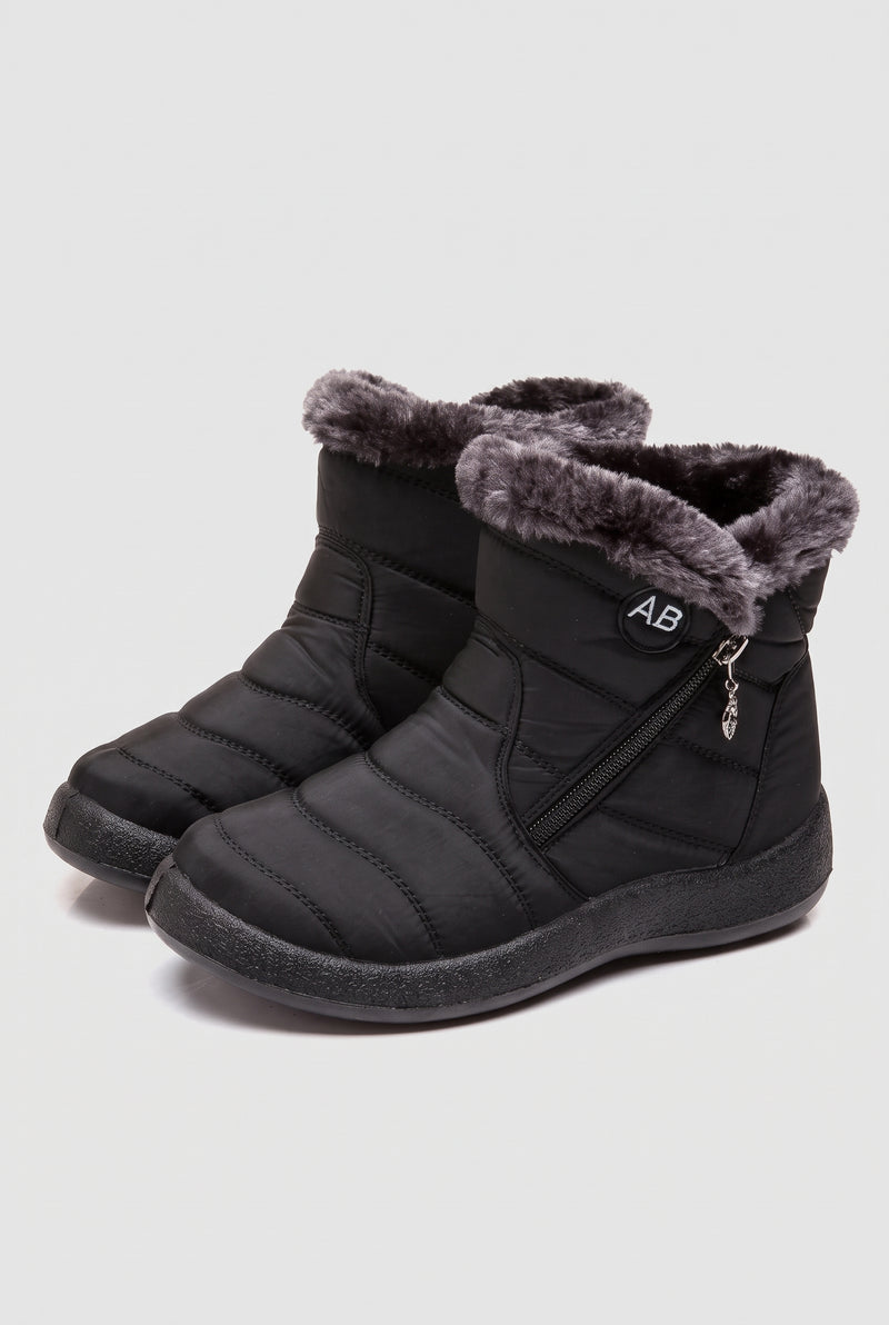 Fleece-Lined Ankle Boots in Black — studio front
