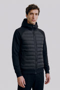 Hybrid Hooded Puffer Jacket in Black — studio front