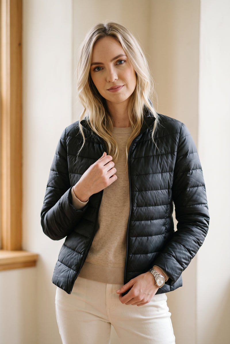 Lightweight Quilted Puffer Jacket in Black — studio front