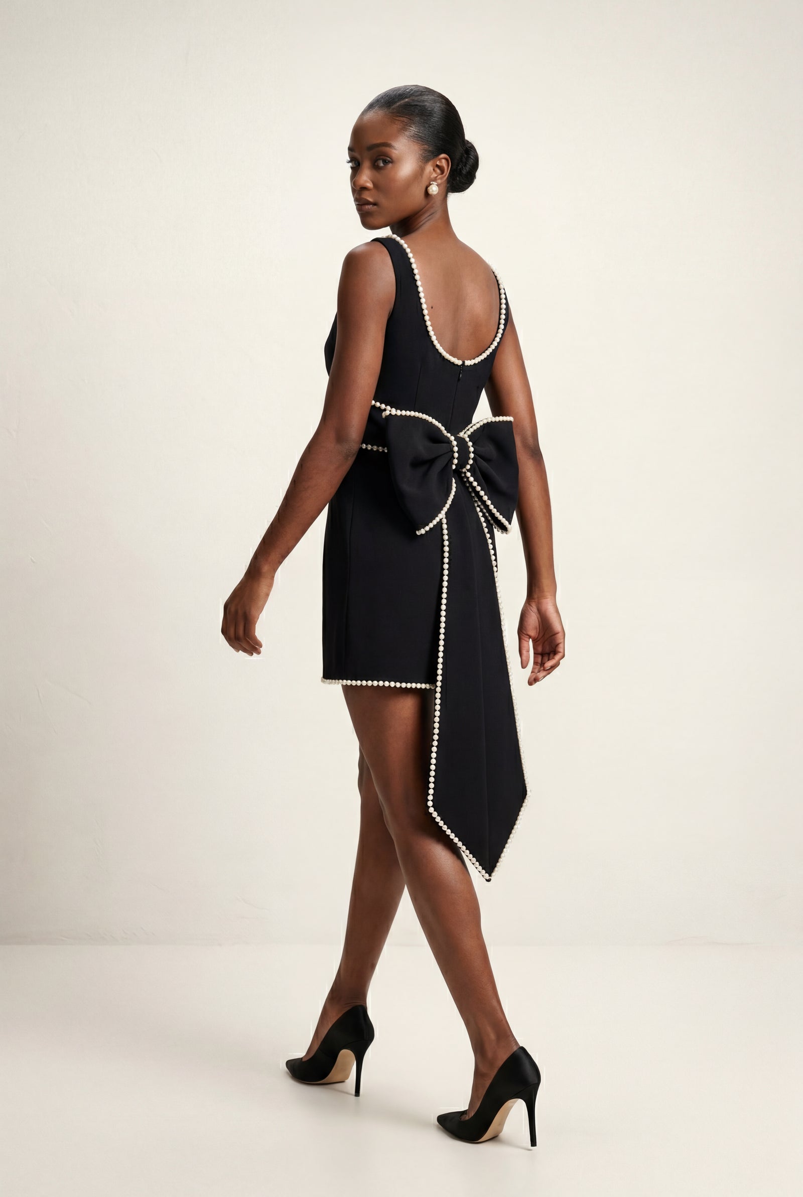 Black Pearl-trim Bow-back Fitted Mini Dress - Photo 3
