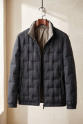 Quilted Hip-Length Puffer Jacket in Black — studio front