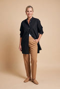 Women's Oversized Button-Up Shirt in Black — primary studio