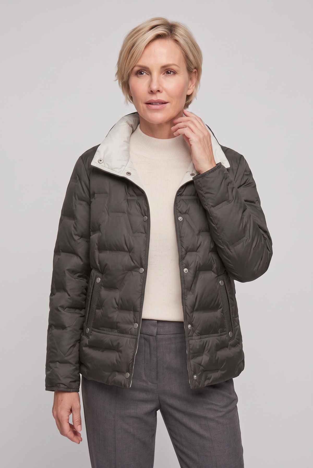 Women's Quilted Puffer Jacket with Stand Collar in Black — studio front
