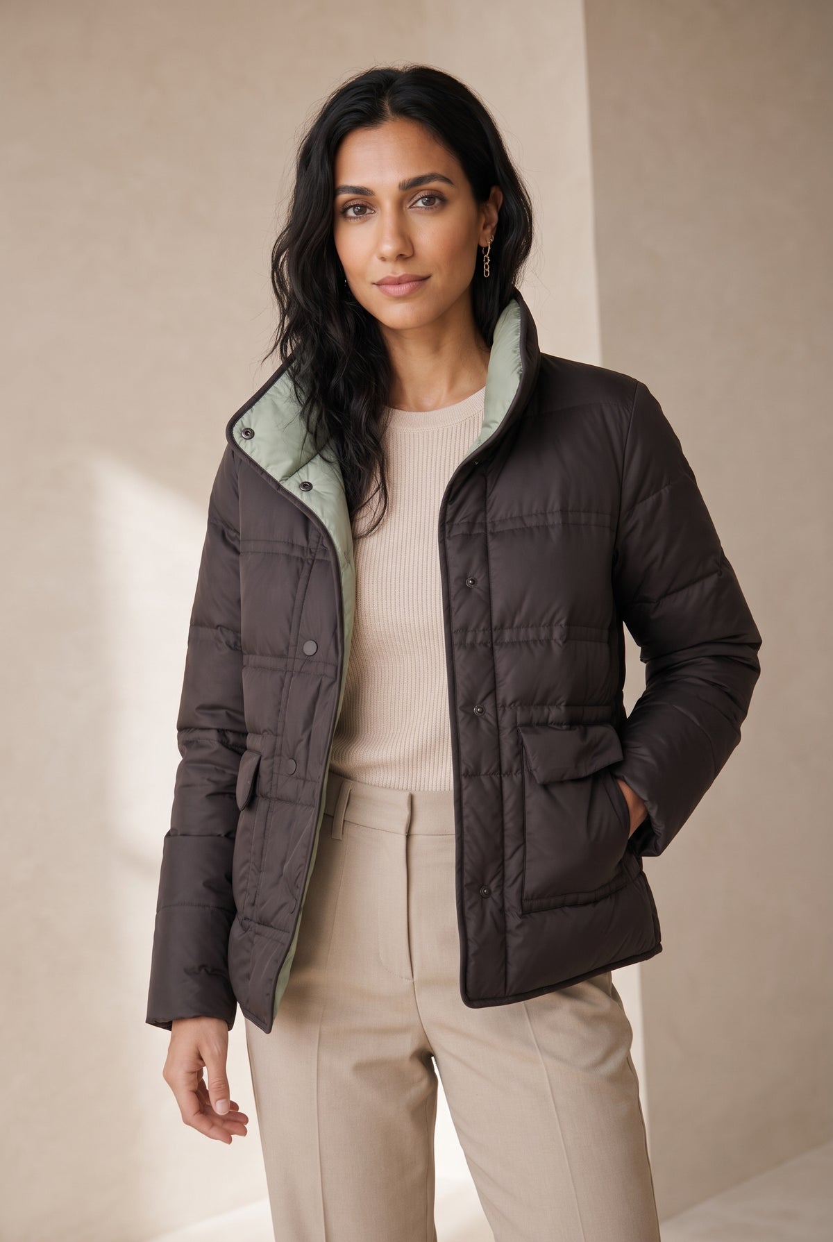 Reversible Quilted Down Jacket in Black — studio front