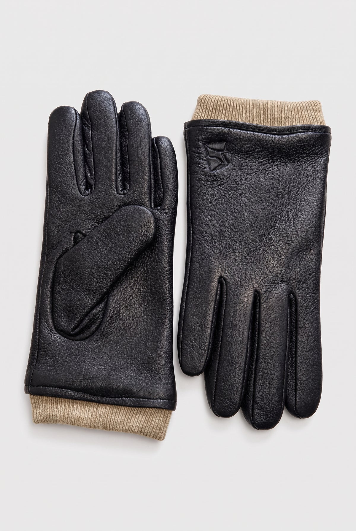 Wool-Lined Driving Gloves in Black — studio front