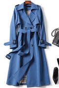 Belted Trench Coat in Blue — front view