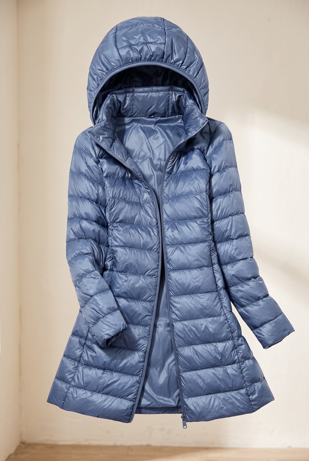 Glossy Hooded Puffer Coat in Blue — studio front
