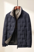 Quilted Hip-Length Puffer Jacket in Blue — studio front