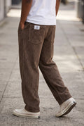 Corduroy Wide-Leg Pants in Brown — studio front