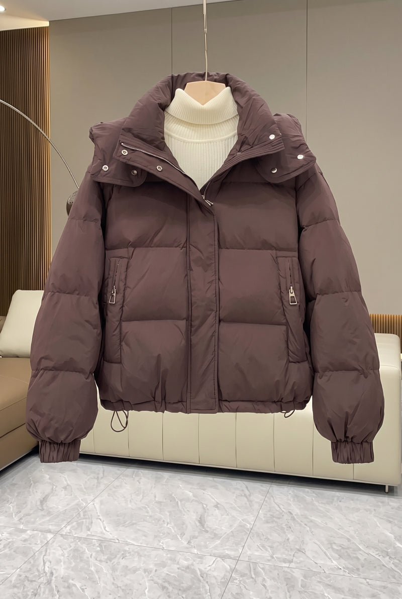 High Neck Hooded Puffer Jacket in Brown — studio front