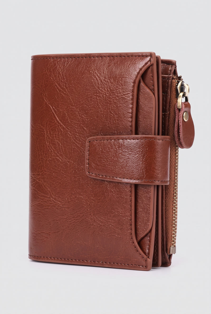 Pebbled Fold-Over Wallet in Brown — studio front
