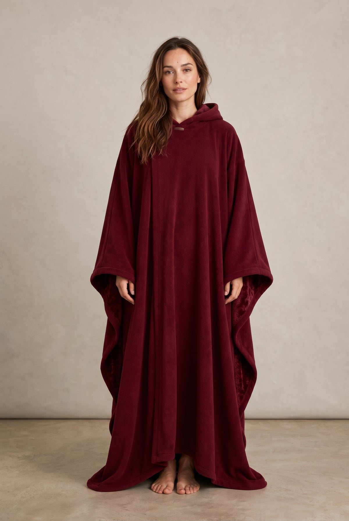 Hooded Cape with Wide Openings in Burgundy — studio front