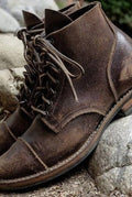 Leather-Like Ankle Boots in Dark Brown — front view