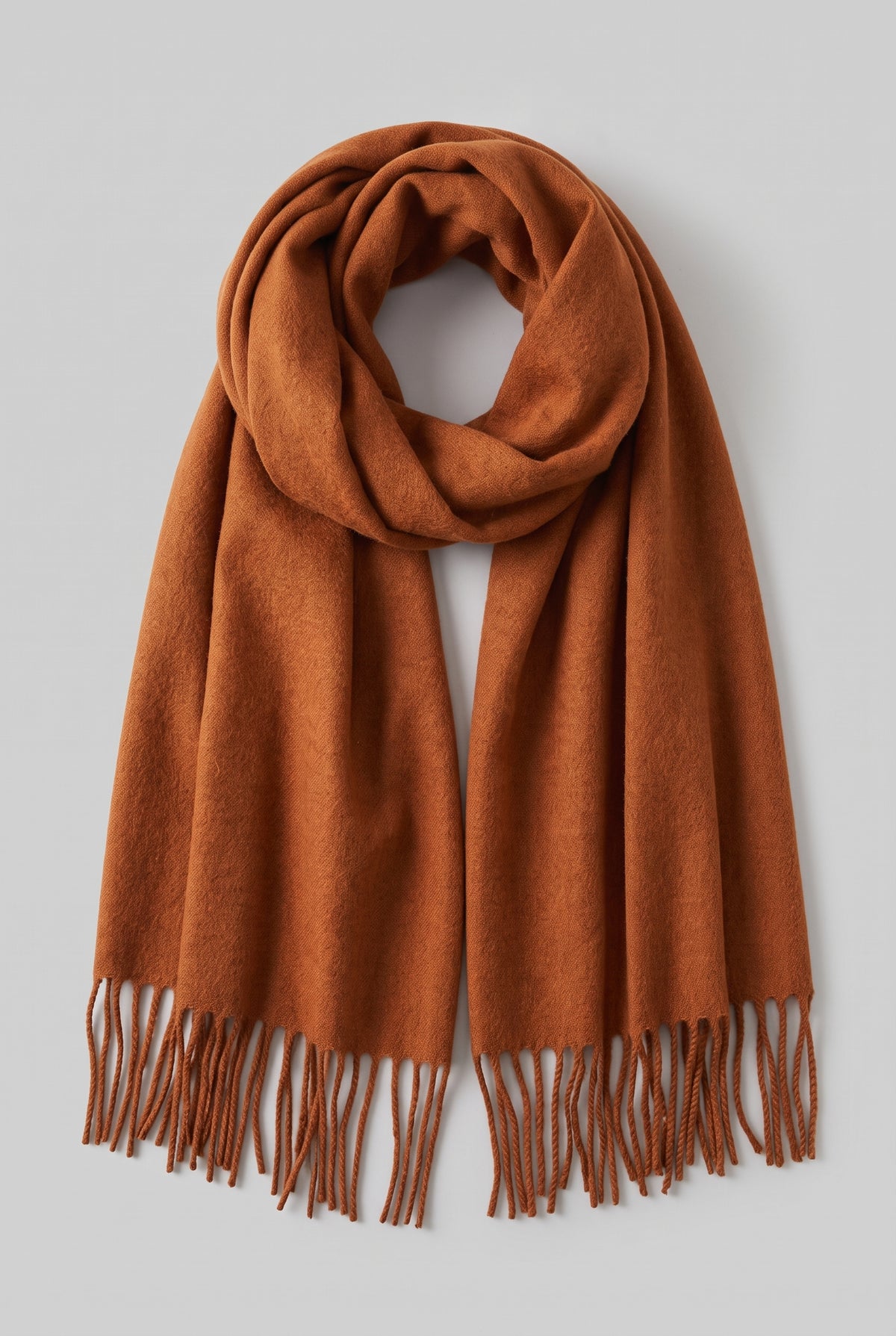 Scarf Tassel Wrap in Dark Orange — studio front