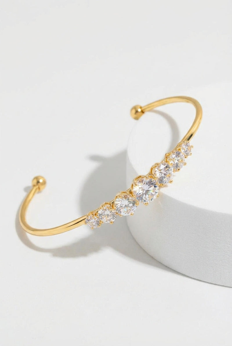Gold Gold Open Bangle Bracelet with Graduated Diamond-style Stones - Bangles - Photo 1