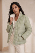 Reversible Quilted Down Jacket in Lime — studio front