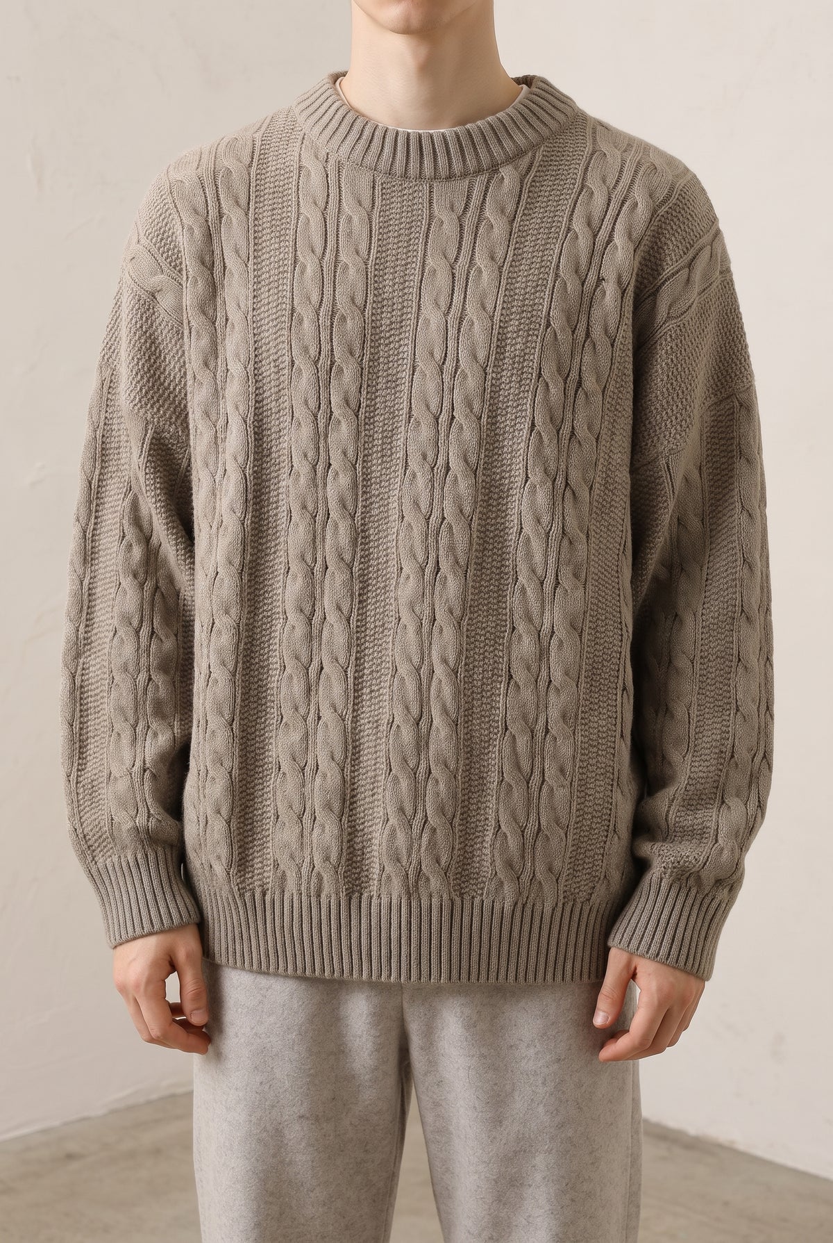 Cable-Knit Crewneck Sweater in Merlot Red — studio front