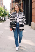 Women's Puffer Jacket Abstract Pattern in Multicolor — lifestyle sidewalk