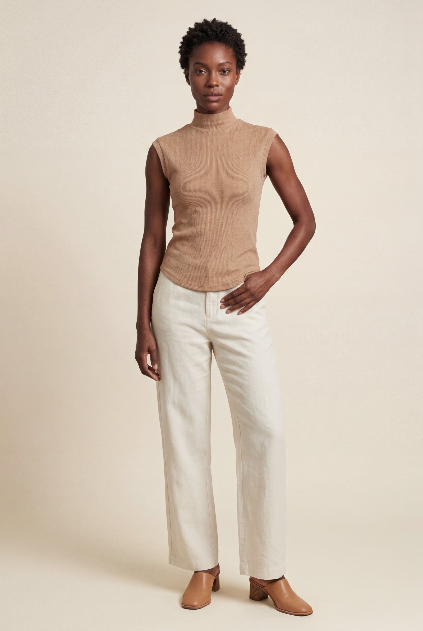 Nude Ribbed Mock Neck Sleeveless Top with Curved Hem - Mock neck tops - Photo 15
