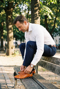 Men's Formal Shoes Lace-Up in Orange — lifestyle park bench