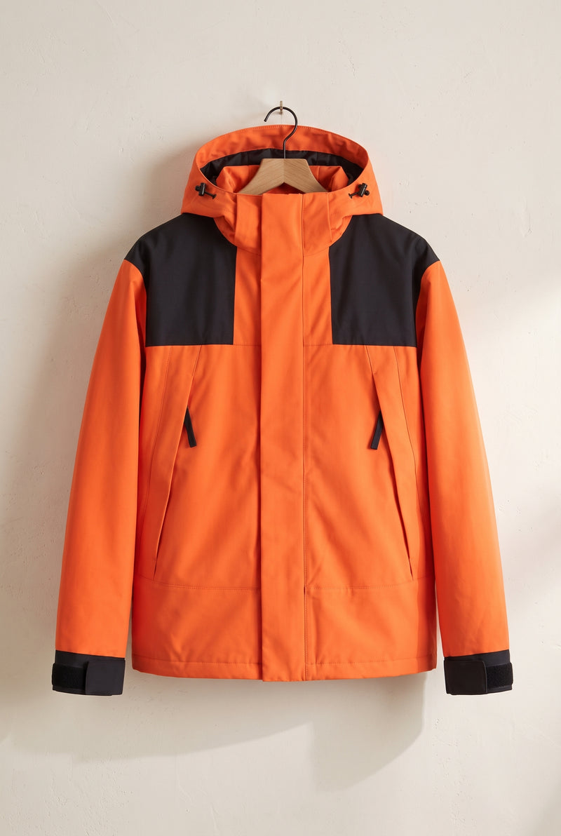 Technical Hooded Ski Jacket in Orange — studio front