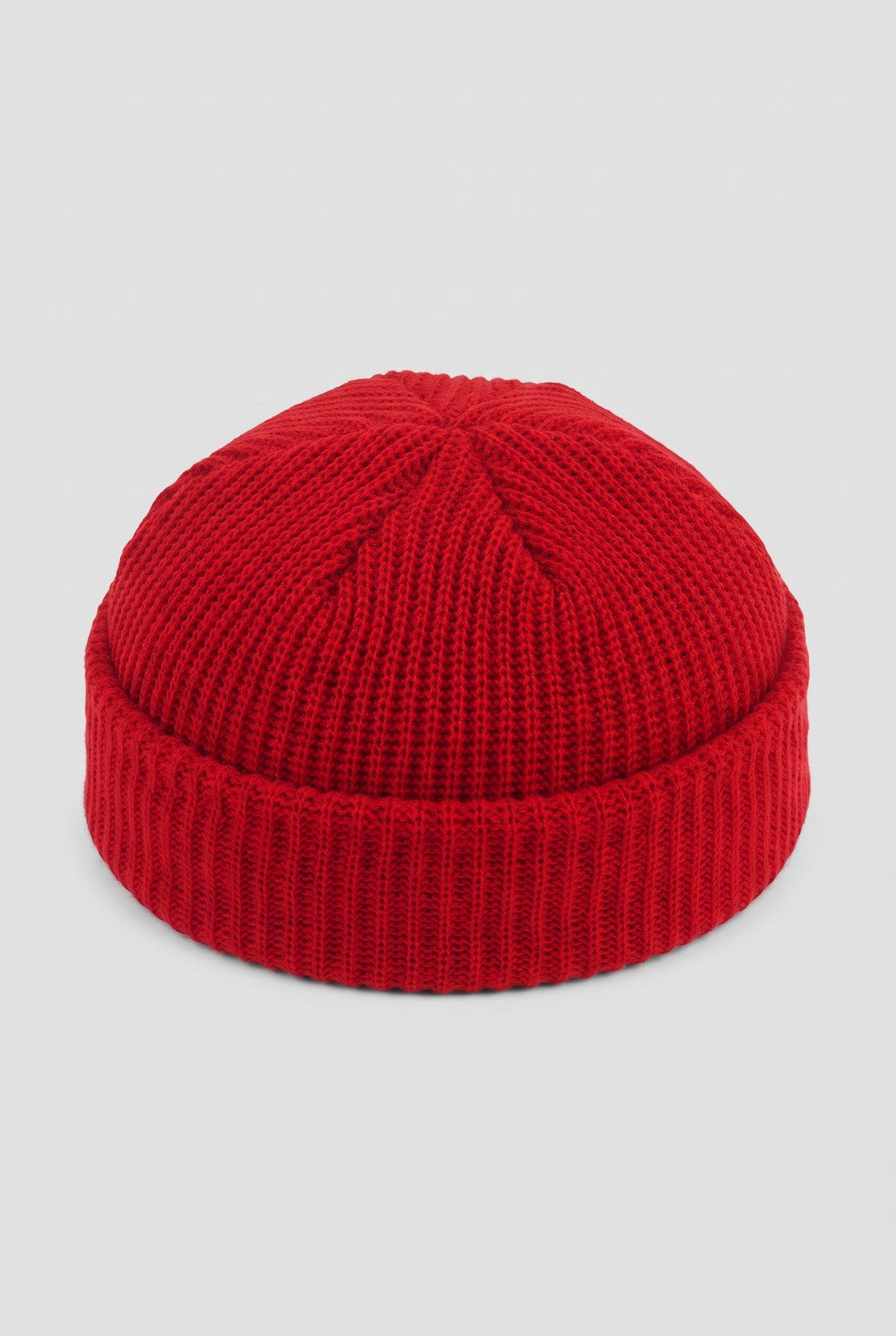 Ribbed Knit Dome Beanie in Red — studio front