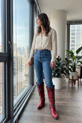 Women's Knee-High Cowboy Boots Riveted in Red — ugc candid city apartment
