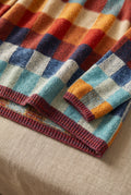 Checkered Merino Turtleneck Sweater in Solid — studio angle
