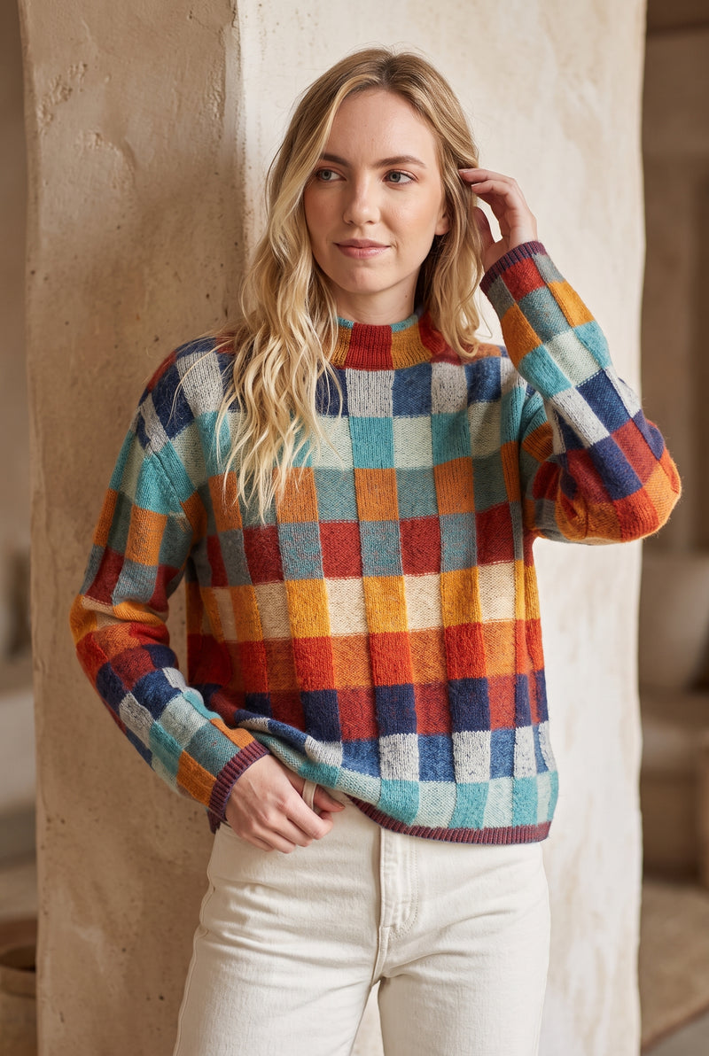 Checkered Merino Turtleneck Sweater in Solid — studio front