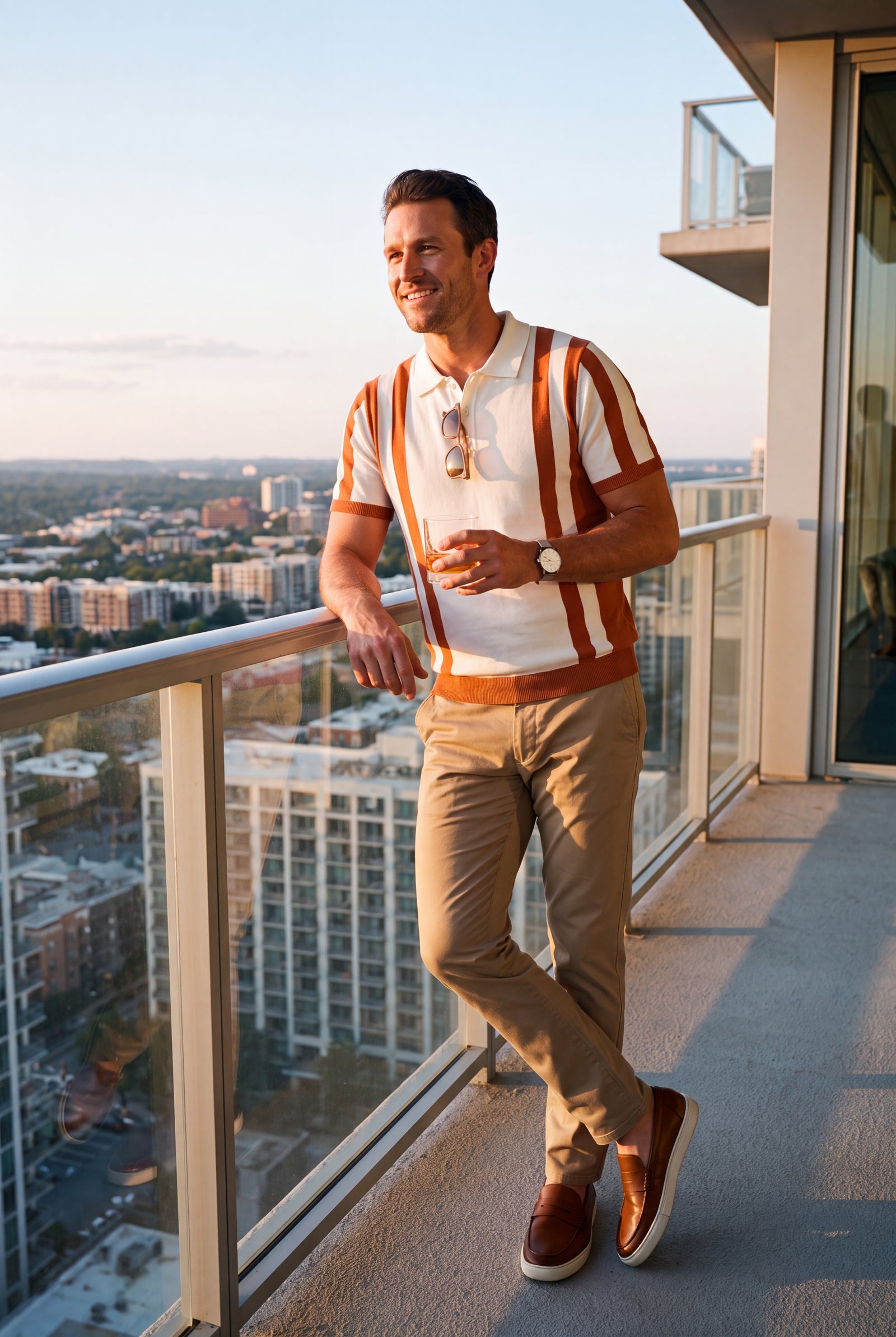 Men Striped Polo Shirt Short Sleeve in Striped White Orange — lifestyle urban balcony