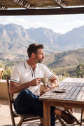 Men's Polo Shirt Color-Blocked Short Sleeve in White — lifestyle evocative