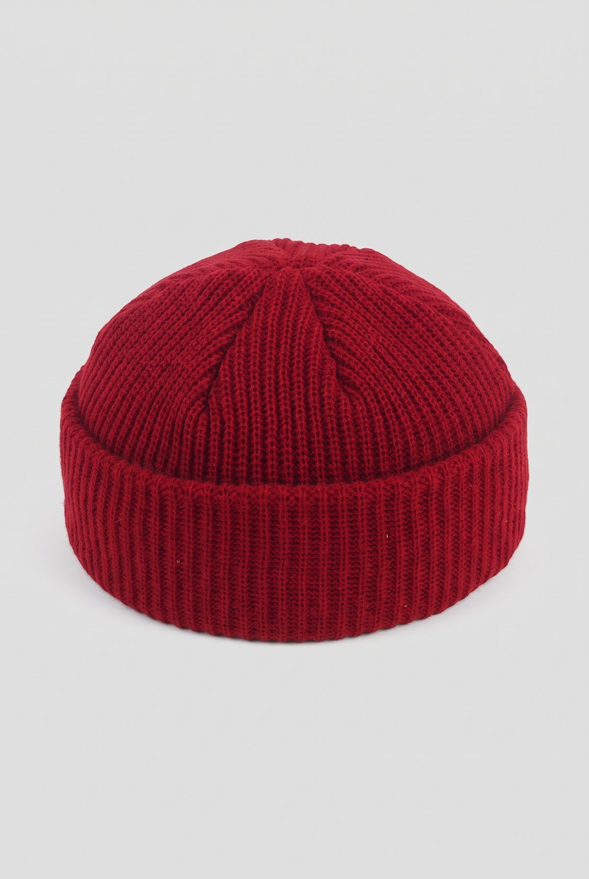 Ribbed Knit Dome Beanie in Wine Red — studio front