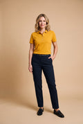 Women's Polo Shirt Elegant Fit in Yellow — studio full body