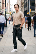Men's Black Cargo Pants in Leather Look k — lifestyle city sidewalk