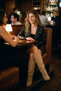 Women's Over-the-Knee Boots Draped in Beige — lifestyle restaurant