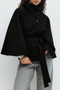 Belted High-Neck Cape Coat in Black — front view