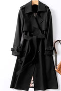 Belted Trench Coat in Black — front view