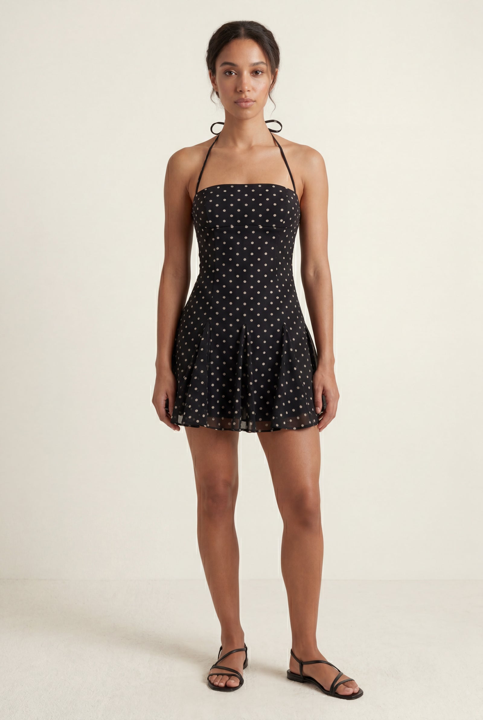 Black Black Polka Dot Halter Mini Dress with Flared Skirt - Photo 1