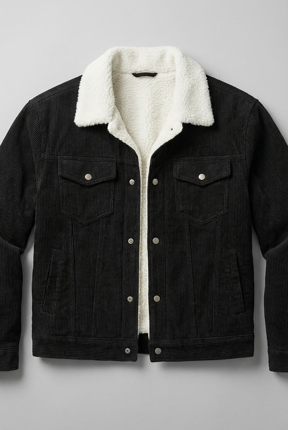 Corduroy Sherpa-Lined Trucker Jacket in Black — front view