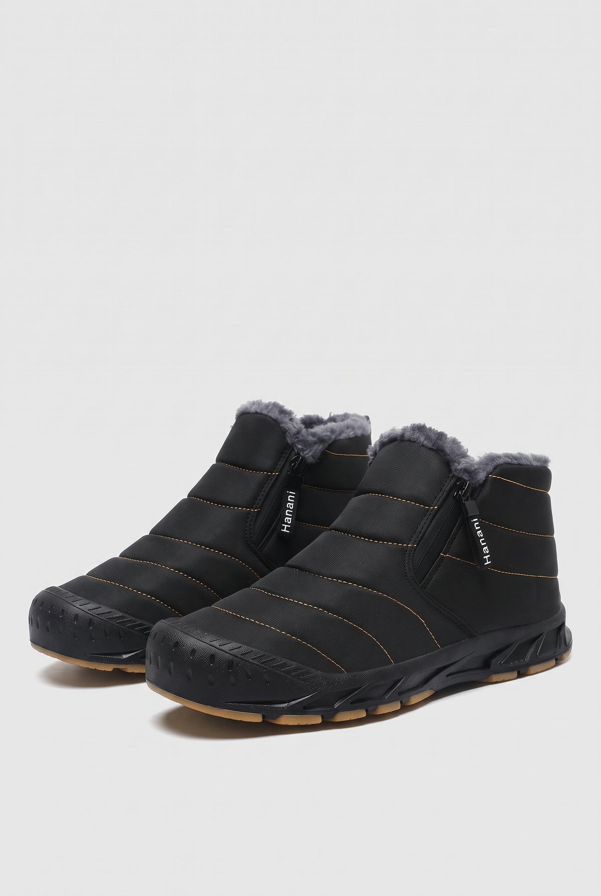 Faux-Fur Lined Winter Boots in Black — studio front