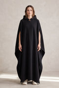 Hooded Cape with Wide Openings in Black — studio front