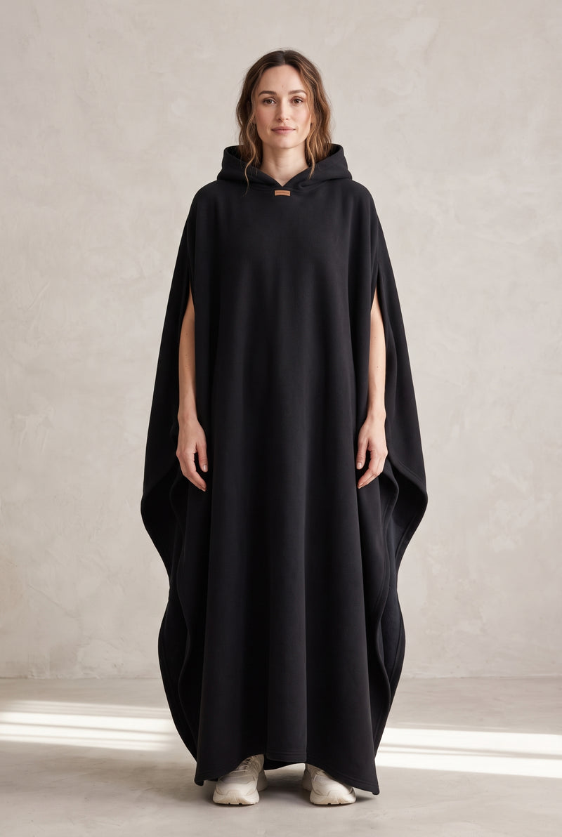 Hooded Cape with Wide Openings in Black — studio front