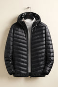 Insulated Quilted Down Jacket in Black — studio front
