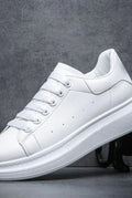 Leather Low-Top Sneakers in Black — side