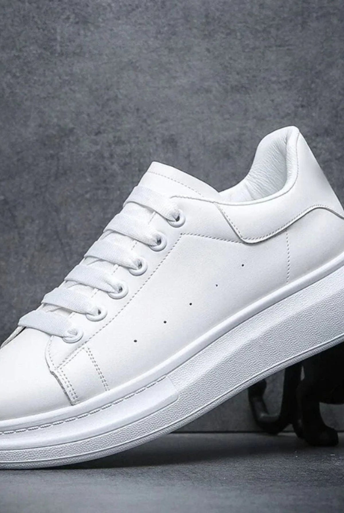 Leather Low-Top Sneakers in Black — side