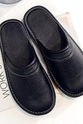 Leather Slip-On Slippers in Black — front view