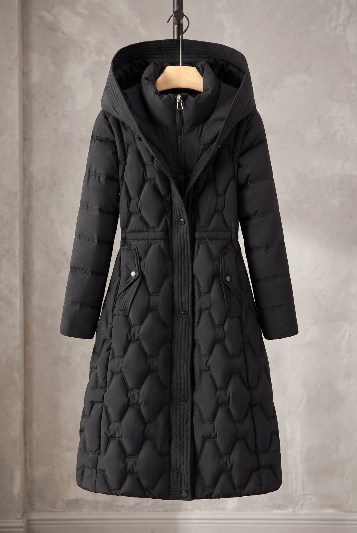 Longline Hooded Puffer Coat in Black — studio front